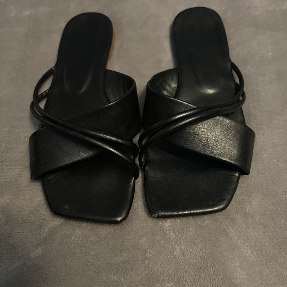 Black slip on sandals